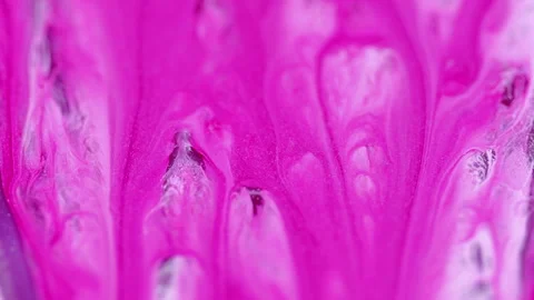 Shimmering paint drip ink flow pink white mix Video stock 266709737