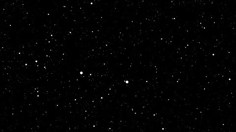 Shimmering particles on a black background Stock Footage 283089893