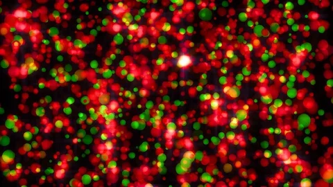 Shimmering red and green lights falling ideal for christmas backgrounds Stock Footage 96492201