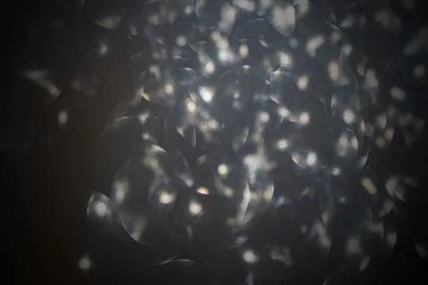 Shimmering reflective circular pattern artwork, showcasing translucent elemen Stock Photos