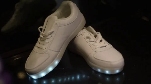 Shimmering Shoes with Rose Stock Footage 72904784