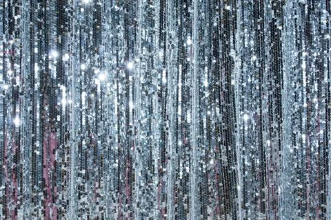 Shimmering silver backdrop creates a festive atmosphere for special events and Stock Photos
