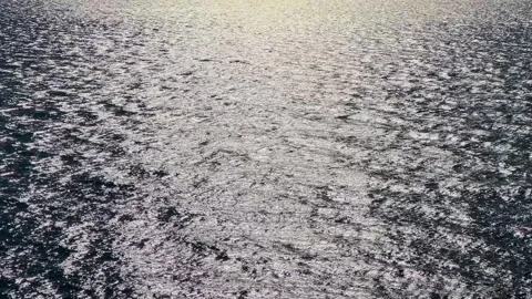 Shimmering water surface with sun reflection Stock Footage 330176070