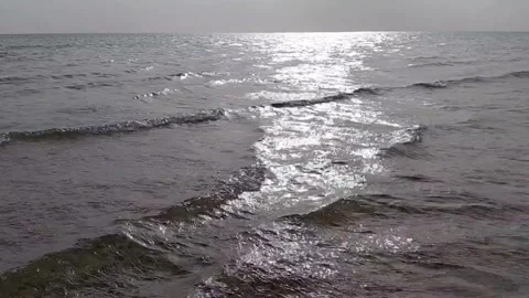 Shimmering waves of the sea Stock Footage 336218719