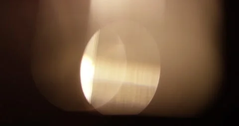 Shimmery light leaks on black background. Lens flare burst overlays with bokeh Stock Footage 168364577