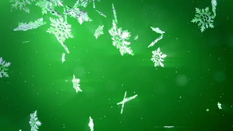 Shining 3d snowflakes float in air on a green background. Use as animated Stock Footage 81660212