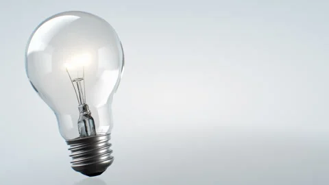 Shining Beautiful Lightbulb with Warm Light Seamless. Electric Light Bulb Like Stock Footage 292888081