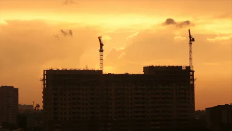 Shining clouds in overcast sky over construction site Stock Footage 158007891