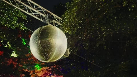 Shining Disco Ball with Light Flare at Outdoor Night Party Stock Footage 345901712