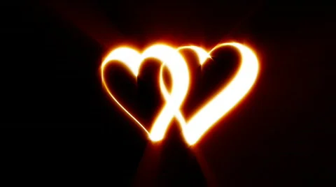 Shining drawing hearts. Looping. Alpha. Stock Footage 563733