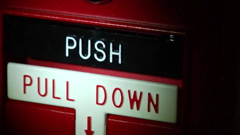 Shining A Flashlight On Fire Alarm ECU Stock-Footage 144420473