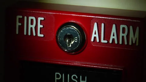 Shining A Flashlight On Fire Alarm ECU Stock-Footage 144420657