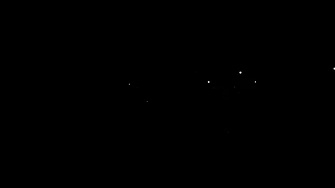 Shining glitter particles over black background Stock Footage 202221791