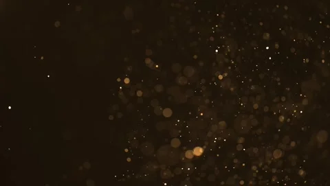 Shining golden particles abstract background. Blurred bokeh background of go Stock Footage 312694120
