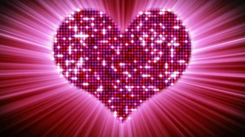 Shining heart shape of pink particles loopable Stock Footage