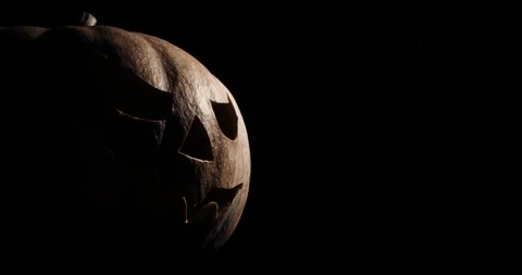 Shining Jack-O-Lantern. Halloween pumpkin with scary face smoke inside with Video stock 94983580