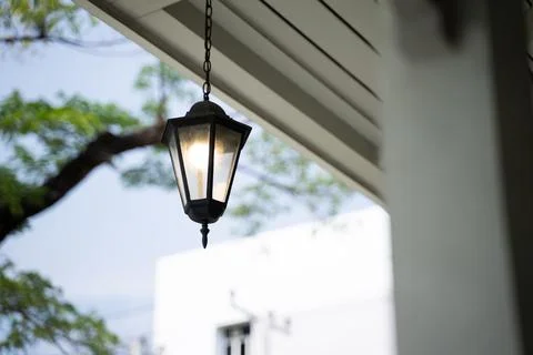 Shining lanterns hanging from the ceiling, blurred background Stock Photos