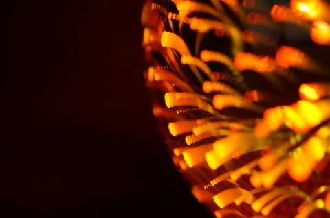 Shining light bulb with firework effect. Abstract background, closeup photo 库存照片