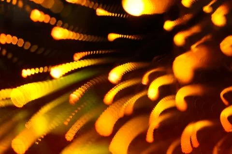 Shining light bulb with firework effect. Abstract background, closeup photo Stock Photos