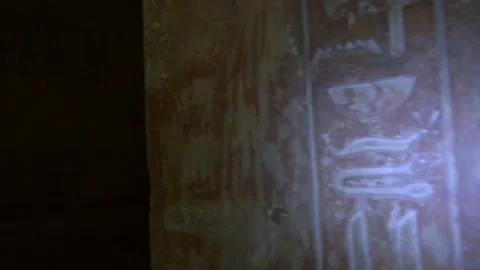 Shining Light On A Wall Inside The Tomb Of Ti In Saqqara, Egypt Video stock 158229087