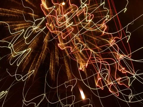 Shining Multicolored Lines in a Darkness. Stock Photos
