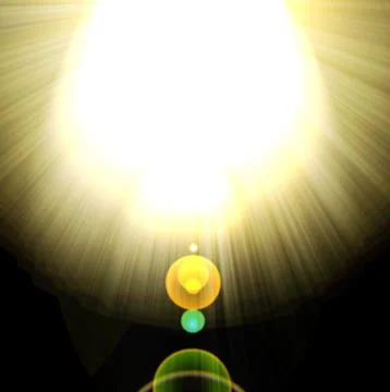 Shining rays of glare  on a dark background Stock Photos