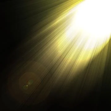 Shining rays of glare  on a dark background Stock Photos