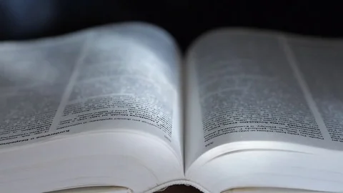 Shining rays of light over an open book. Stock Footage 73462266