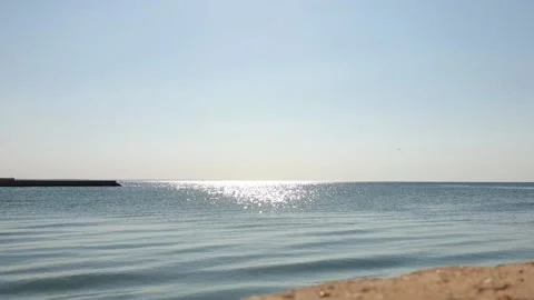 The shining sea at dawn in motion Stock Footage 137423878