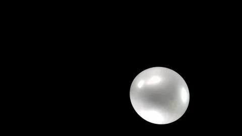 Shining Silver Balloon Gracefully Falling Against a Bold, Deep Black Background Stock Footage 303633059