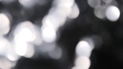 Shining silver bokeh out of focus glitter abstract dark background Stock Footage 146476207