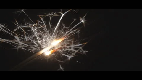 Shining sparkler in the night Stock Footage 96066791