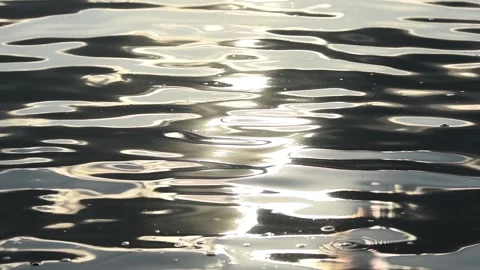 Shining sparkling water with sun reflection shining. summer day. Slow motion Stock Footage 94389276