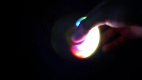 Shining spinner in black background Stock Footage 78186831