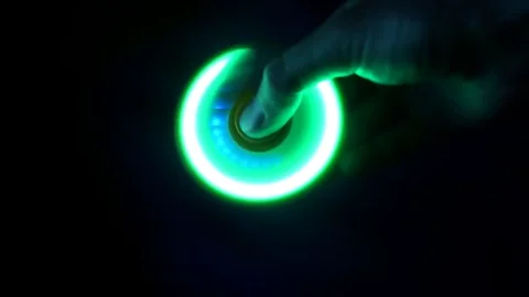 Shining spinner in black background Stock Footage 78186833