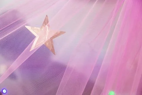 Shining star on the curtains Stock Photos