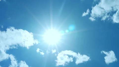 Shining Sun in Clear Azure Sky and Few Puffy White Clouds, Time lapse. Sunlight, Stock Footage 196221393