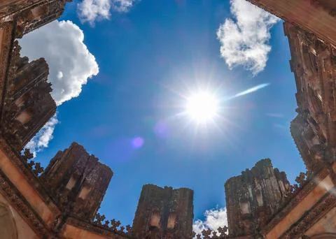 Shining sun visible from the inside of a Gothic Monastery Portugal Stock Photos