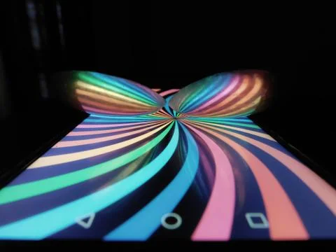 The shining of the two spoons on a shiny surface Stock Photos