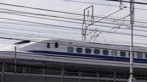 Shinkansen and Meitetsu Train Pass Near Nagoya Station Stock Footage 32238460