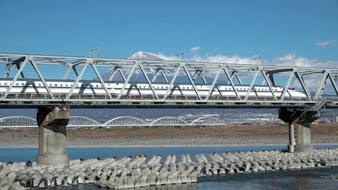 Shinkansen bullet train and Mt Fuji in Fujikawa bridge, Shizuoka. Japan Stock Footage 101674832