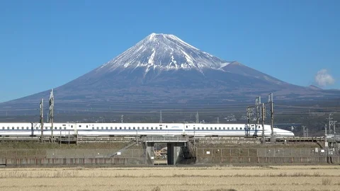 Shinkansen bullet train passing and Mt Fuji, prefecture, Japan Stock Footage 101672297