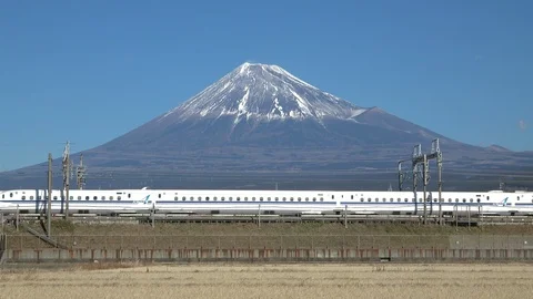 Shinkansen bullet train passing and Mt Fuji, prefecture, Japan Stock Footage 101672712
