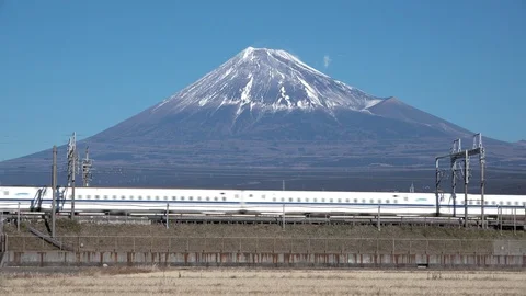 Shinkansen bullet train passing and Mt Fuji, prefecture, Japan Stock Footage 101673037