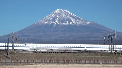 Shinkansen bullet train passing and Mt Fuji, prefecture, Japan Stock Footage 101673092