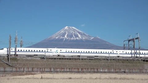Shinkansen bullet train passing and Mt Fuji, prefecture, Japan Stock Footage 101673207