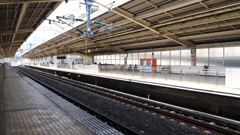 Shinkansen Train passing through Atami Station in Japan Stock Footage 88789217