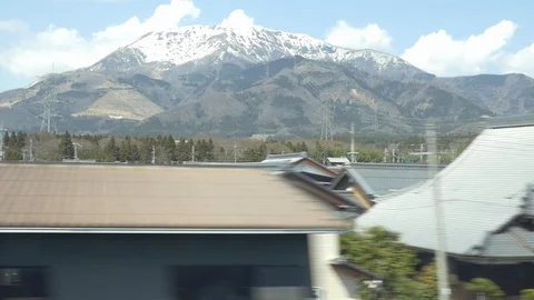 Shinkansen window mountain landscape Stock Footage 104441825