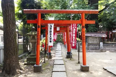 Shinto element red torii gates to Takeyori Inari Shrine in Kishimojin Templ.. Stock Photos