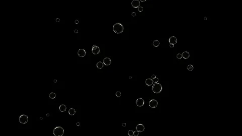 Shiny air bubbles ascending motion on black background cinematic footage Stock Footage 327568790